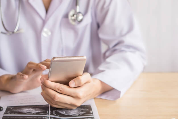 Physician is holding a consultation using telemedicine technology